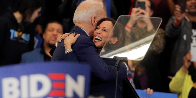 Democratic U.S. presidential candidate and former Vice President Joe Biden is greeted by U.S. Senator Kamala Harris during a campaign stop in Detroit, Michigan, U.S., March 9, 2020.