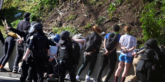 Protesters marching against the death in Minneapolis police custody of George Floyd are detained by police in Philadelphia, Pennsylvania June 1, 2020.