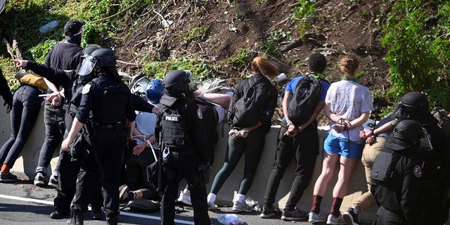 Protesters marching against the death in Minneapolis police custody of George Floyd are detained by police in Philadelphia, Pennsylvania June 1, 2020.