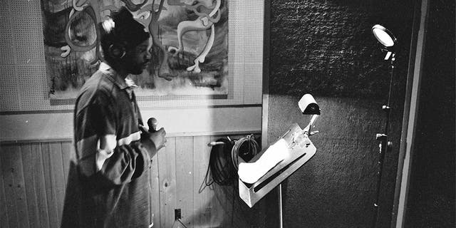 This image provided by @mpozitolbertphotography shows Malik B in studio. The rapper and founding member of The Roots, has died. He was 47. 