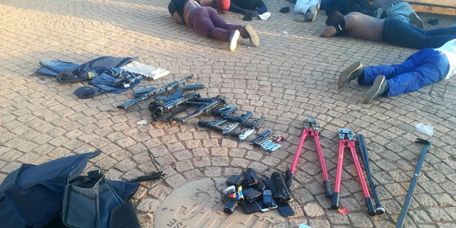 South African police seized weapons and made more than 40 arrests after responding to a hostage situation at International Pentcost Holiness Church, Zuurbekom, overnight Saturday.