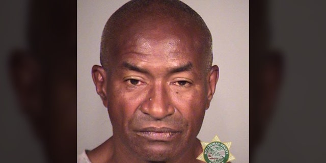 Police got 911 calls that Shane Vordelmicha Green had assaulted people with the handsaw and a belt, broken car windshields and threatened people. (Portland Police)