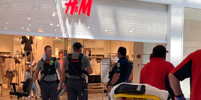 Authorities continue their investigation of a shooting at Riverchase Galleria shopping mall, Friday, July 3, 2020, in Hoover, Ala., that left an 8-year-old boy dead and three other people hospitalized.