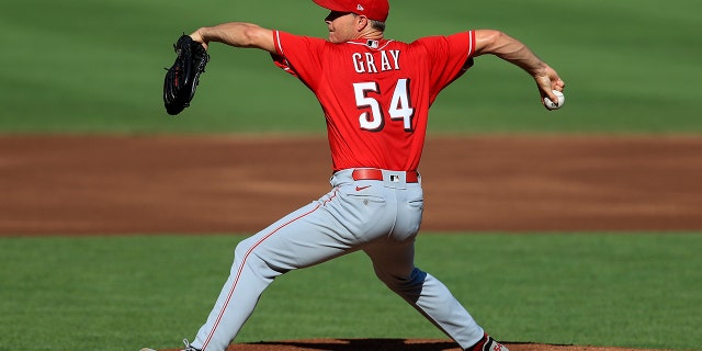 Cincinnati Reds' Sonny Gray throws during an intrasquad game at the baseball team's practice in Cincinnati, Tuesday, July 14, 2020. (AP Photo/Aaron Doster)