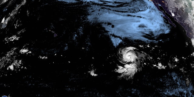 Hurricane Douglas can be seen swirling in the Pacific early July 22.