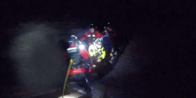Three people were rescued from a sinking boat on Saturday in Texas as Hurricane Hanna roared ashore.