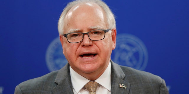 Minnesota Governor Tim Walz speaks about a change in charges to the officers involved in the death in Minneapolis police custody of George Floyd, in St Paul, Minnesota, June 3, 2020. REUTERS/Lucas Jackson