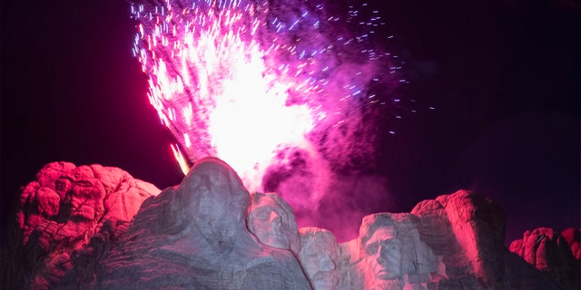 Fireworks light the sky at Mount Rushmore National Memorial, Friday, July 3, 2020, near Keystone, S.D., after President Donald Trump spoke. (AP Photo/Alex Brandon)
