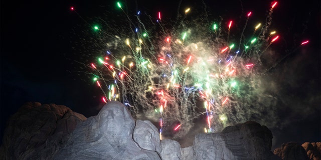 Fireworks light the sky at Mount Rushmore National Memorial, Friday, July 3, 2020, near Keystone, S.D., after President Donald Trump spoke. (AP Photo/Alex Brandon)