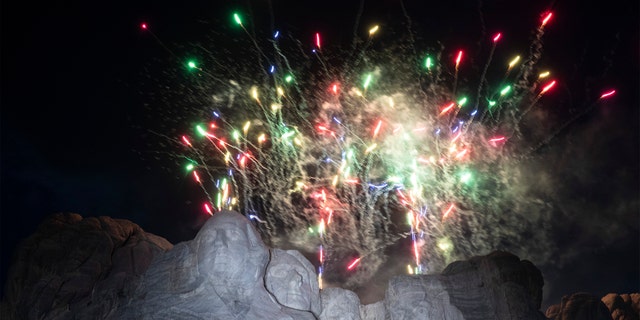 Fireworks light the sky at Mount Rushmore National Memorial, Friday, July 3, 2020, near Keystone, S.D., after President Donald Trump spoke. (AP Photo/Alex Brandon)