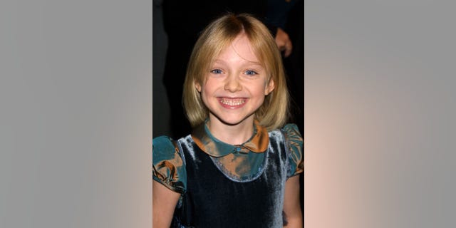 Dakota Fanning attending the 7th Annual Los Angeles Critics Choice Awards at the Beverly Hills Hotel circa 2002.