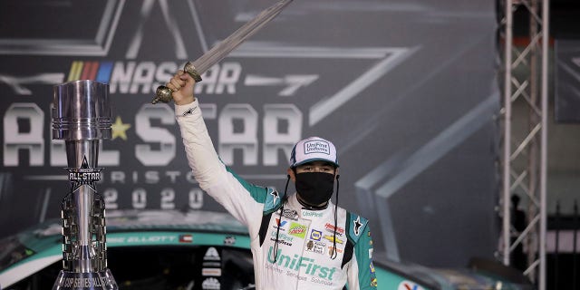 Elliott holding the sword winners get at Bristol, which bills itself as "The Last Great Colosseum."