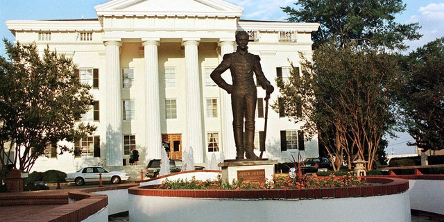 This June 10, 1999, file photograph shows the bronze statue of Andrew Jackson in front of Jackson, Miss., City Hall. The City Council voted 5-1, Tuesday, July 7, 2020, to relocate the bronze figure in a less prominent spot.