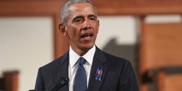 Former President Barack Obama, addresses the service during the funeral for the late Rep. John Lewis, D-Ga., at Ebenezer Baptist Church in Atlanta, Thursday, July 30, 2020. (Alyssa Pointer/Atlanta Journal-Constitution via AP, Pool)