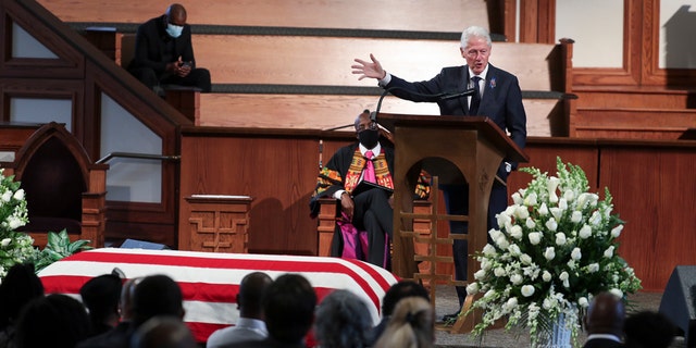 Former President Bill Clinton speaks during the funeral service for the late Rep. John Lewis, D-Ga., at Ebenezer Baptist Church in Atlanta, Thursday, July 30, 2020. (Alyssa Pointer/Atlanta Journal-Constitution via AP, Pool)