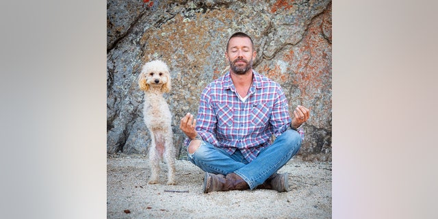 Cora and Zack Skow, pictured. Skow, who runs Marley's Mutts Dog Rescue, suspects that the precious pup sustained the traumatic injuries after being run over by a car.