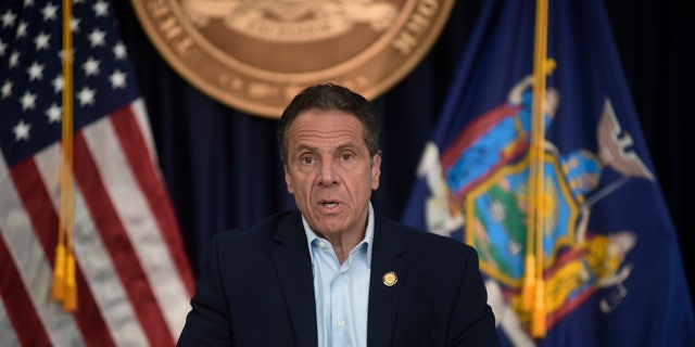 New York Gov. Andrew Cuomo briefs the media during a coronavirus news conference at his office in New York in May. He is now looking for further enforce a 14-day quarantine for people visiting New York from certain states. (AP/New York Post).