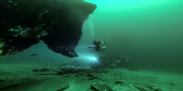 These stunning underwater pictures show the wreckage of a German submarine that was sunk during the Second World War. (Credit: SWNS)