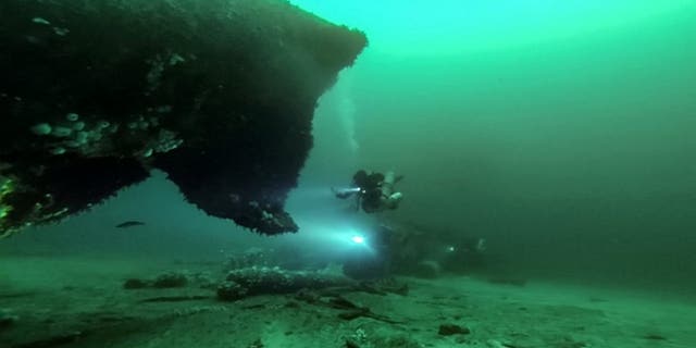 These stunning underwater pictures show the wreckage of a German submarine that was sunk during the Second World War. (Credit: SWNS)