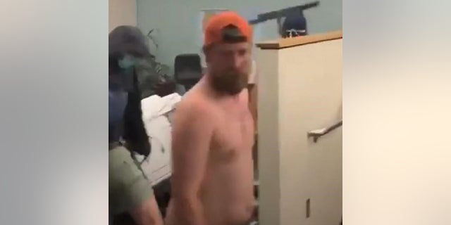 Prosecutors believe Thomas Schinzing spread a May 29 fire in the Corrections Records Office of Portland's Justice Center by moving flaming papers into separate cubicles.