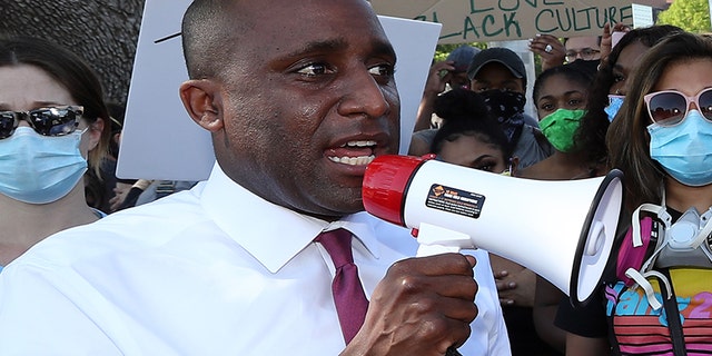Kansas City Mayor Quinton Lucas addresses demonstrators with a bullhorn during a protest at the Country Club Plaza on May 31, 2020 in Kansas City, Missouri. (Photo by Jamie Squire/Getty Images)