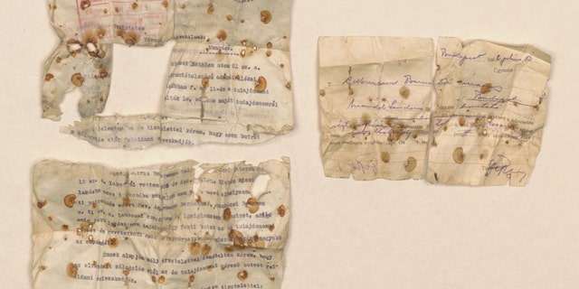 Documents discovered in a shoe. (Memorial and Museum Auschwitz-Birkenau www.auschwitz.org)