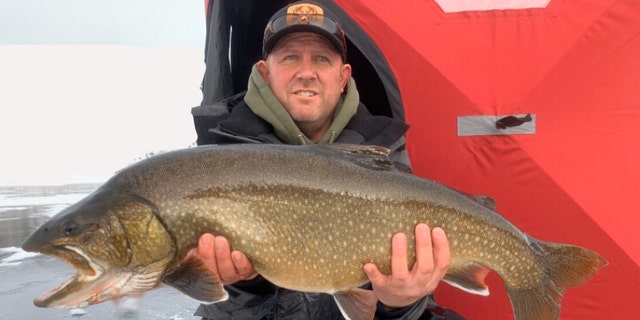 Cade Tebbs and his 33-inch splake from Fish Lake, which held a record for a few months.