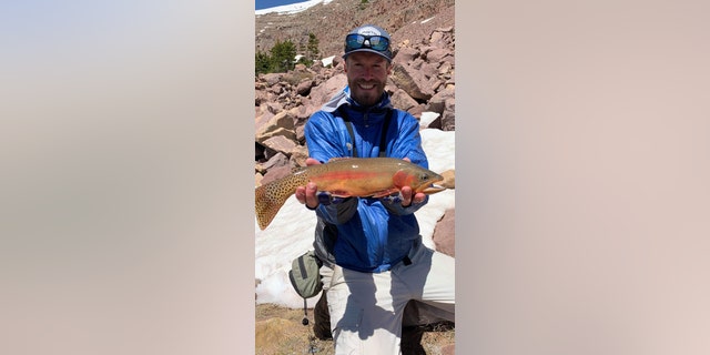 Kendall Johnson and his record golden trout.