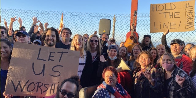 A group of Christian gathered at the Golden Gate Bridge in San Francisco to protest in worship the state's ban on singing in churches citing a surge in COVID-19 cases.