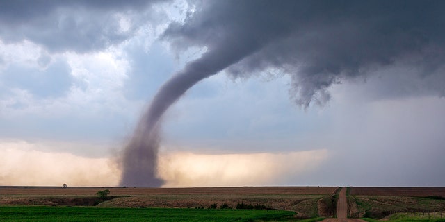 If that funnel cloud makes contact with the ground or has a debris cloud or dust whirl beneath it, then it's classified as a tornado.