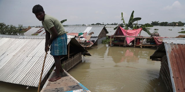India Floods Landslides Leave At Least 77 Dead In Assam State Fox News 