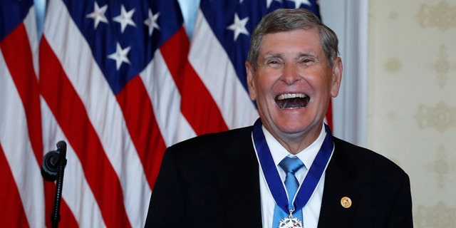 Jim Ryun reacts after President Donald Trump presented the Presidential Medal of Freedom to Ryun, in the Blue Room of the White House, Friday, July 24, 2020, in Washington. (AP Photo/Alex Brandon)