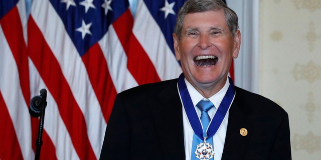 Jim Ryun reacts after President Donald Trump presented the Presidential Medal of Freedom to Ryun, in the Blue Room of the White House, Friday, July 24, 2020, in Washington. (AP Photo/Alex Brandon)