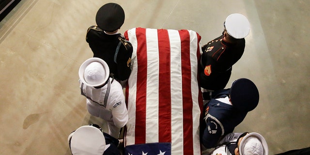 The casket of the late Rep. John Lewis, D-Ga., arrives to lie in repose at Troy University on Saturday, July 25, 2020, in Troy, Ala. (AP Photo/Brynn Anderson)