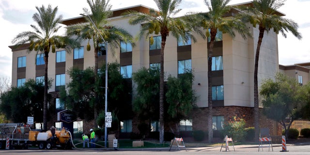 A Hampton Inn is shown Tuesday, July 21, 2020 in Phoenix. (AP Photo/Matt York)