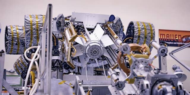 Multi-Mission Radioisotope Thermoelectric Generator for NASA's Mars 2020 persistence of the car is shown in a suitable check of the vehicle in a payload processing facility at NASA's Kennedy Space Center in Florida on 16-17 December 2020. (Credit: NASA/JPL-Caltech/KSC/DOE)