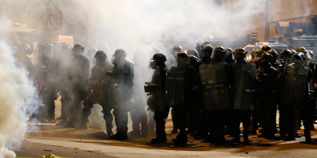 Virginia newspaper calls out local leaders after Richmond riots: 'Enough is enough' 3 Police and protesters square off outside the Richmond Police Department headquarters on Grace Street in Richmond, Va., Saturday, July 25, 2020.