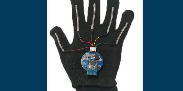 The system includes gloves with thin, stretchable sensors that run the length of each of the five fingers.
