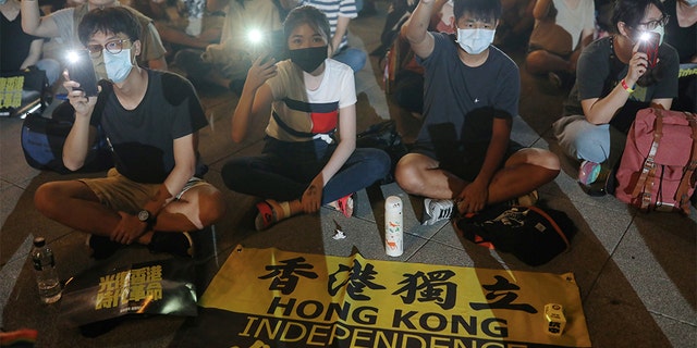 Supporters of Hong Kong anti-government movement gather at Liberty Square, to mark the one-year anniversary of the start of the protests in Hong Kong, in Taipei, Taiwan, June 13, 2020. REUTERS/Ann Wang - RC2F8H9ZDYKZ