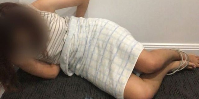 Scammers convince Chinese students to take photos of themselves bound and gagged in order to avoid being deported or arrested. (New South Wales Police)