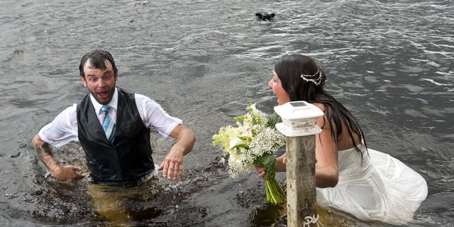 Moments later, the Vancouver Island woman emerged from the water – to discover that her new husband had tumbled in with her.