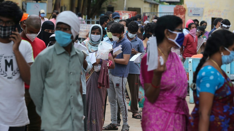 India Sees Lockdowns Reimposed As Coronavirus Surge Nears 1 Million ...