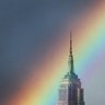 A rainbow passes through the Empire State Building during a storm in New York City, June 29, 2020.