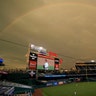 A rainbow is seen over Nationals Park during a game between the Washington Nationals and Toronto Blue Jays in Washington, July 28, 2020. 