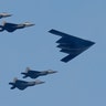 A B2 bomber leads a group of fighter jets in a flyover as part of Independence Day festivities in New York City, July 4, 2020.