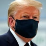 President Donald Trump wears a face mask as he participates in a tour of the Bioprocess Innovation Center at Fujifilm Diosynth Biotechnologies in Morrisville, N.C., July 27, 2020.