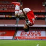 Arsenal's Pierre-Emerick Aubameyang celebrates after scoring his third goal during their English Premier League soccer match against Norwich City in London, July 1, 2020.