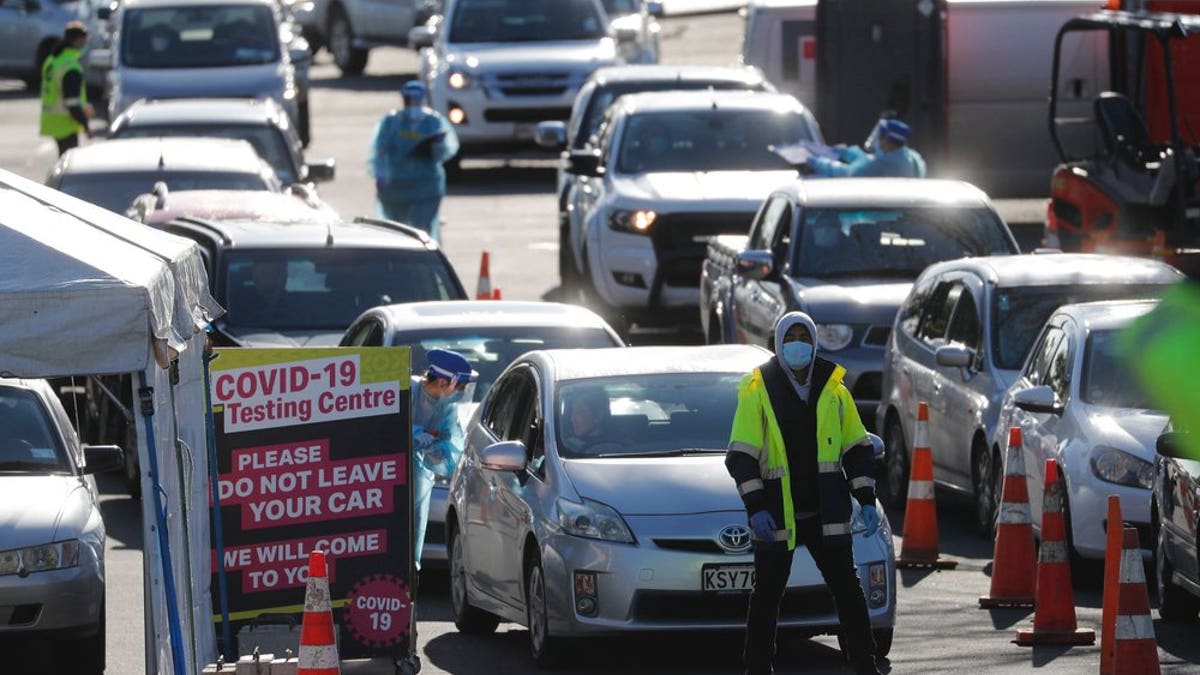 Cars queue at a COVID-19 test centre in Auckland, New Zealand, Aug. 13. Health authorities in New Zealand are scrambling to trace the source of a new outbreak of the coronavirus as the nation's largest city goes back into lockdown. (AP Photo/Dean Purcel)