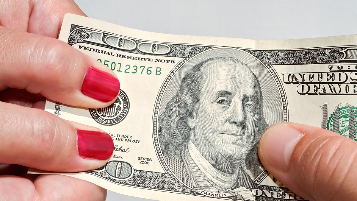 The "ballistic" bridesmaid is allegedly not giving up on her quest to recoup her $140. (iStock)