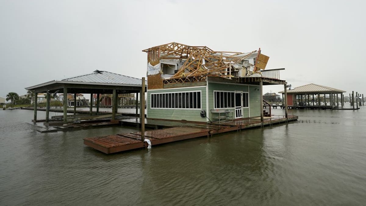 Foodwaters cover the street Friday, Aug. 28, 2020, in Cameron, La., after Hurricane Laura moved through the area Thursday. (AP Photo/David J. Phillip)